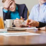 people siting desk holding pencils 1000x667 1 1 1 1 1 1 1 1 1 1 1